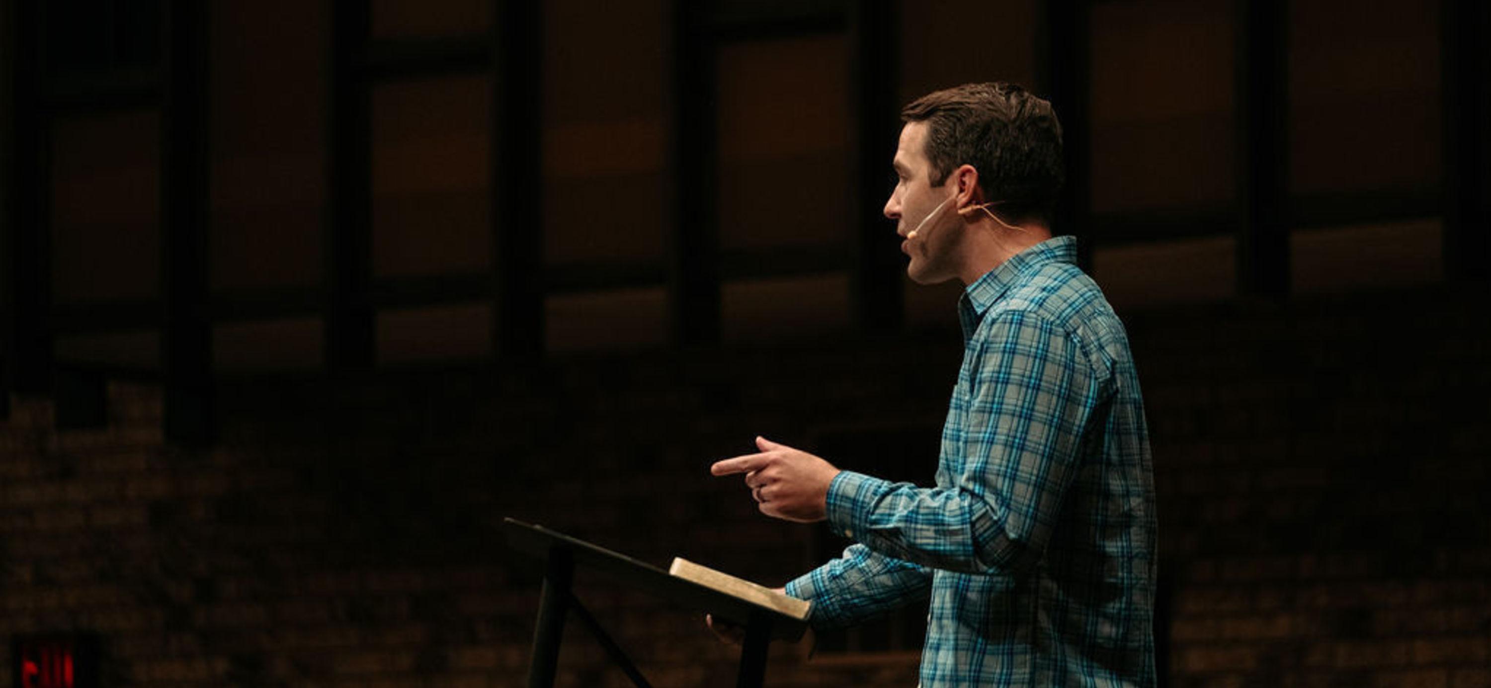 pastor preaching in pulpit